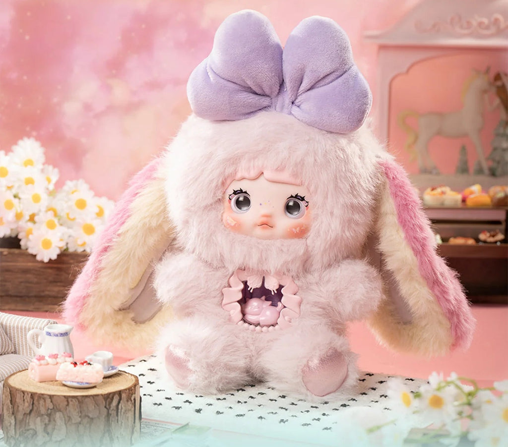 Plush toy with a large bow in a soft, pastel-colored room